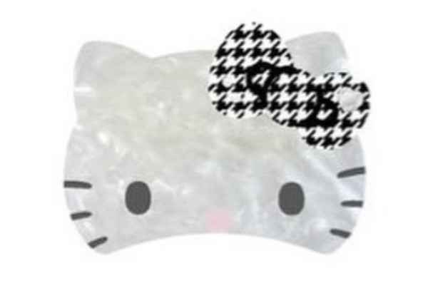 Hello Kitty hair clip with rhinestones, monochrome.